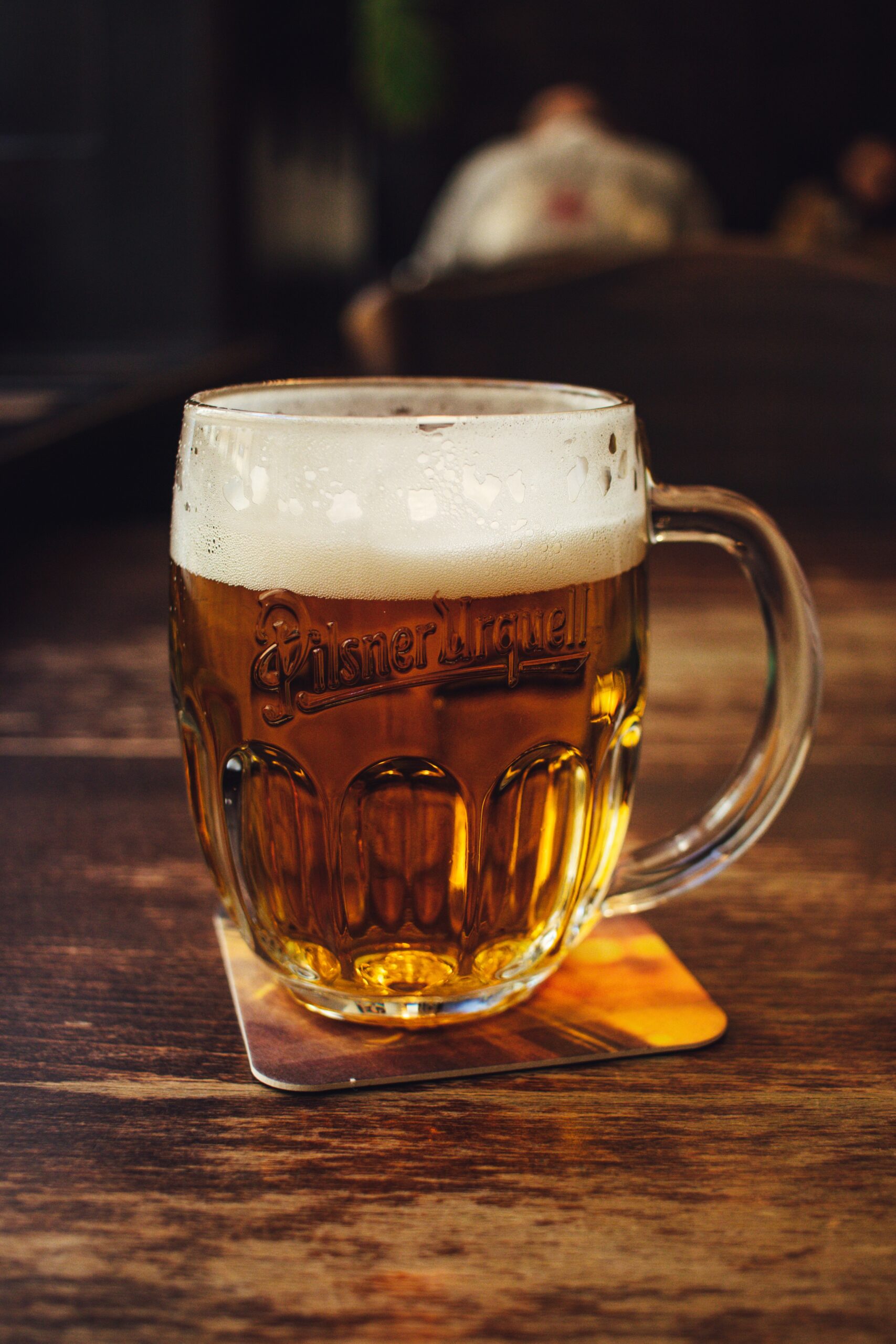Mug of beer with a frothy head