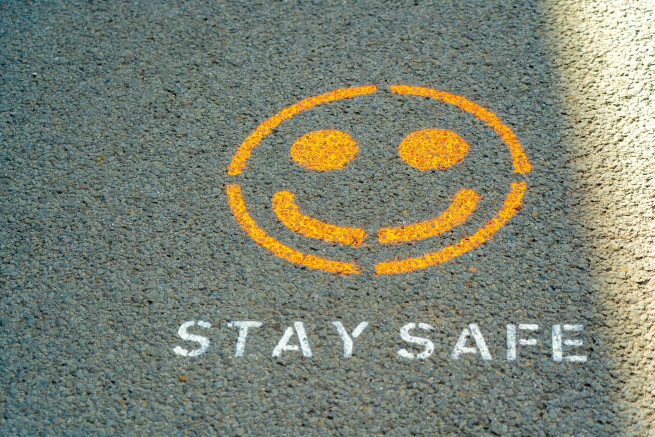 Smiley face with text saying 'Stay Safe'